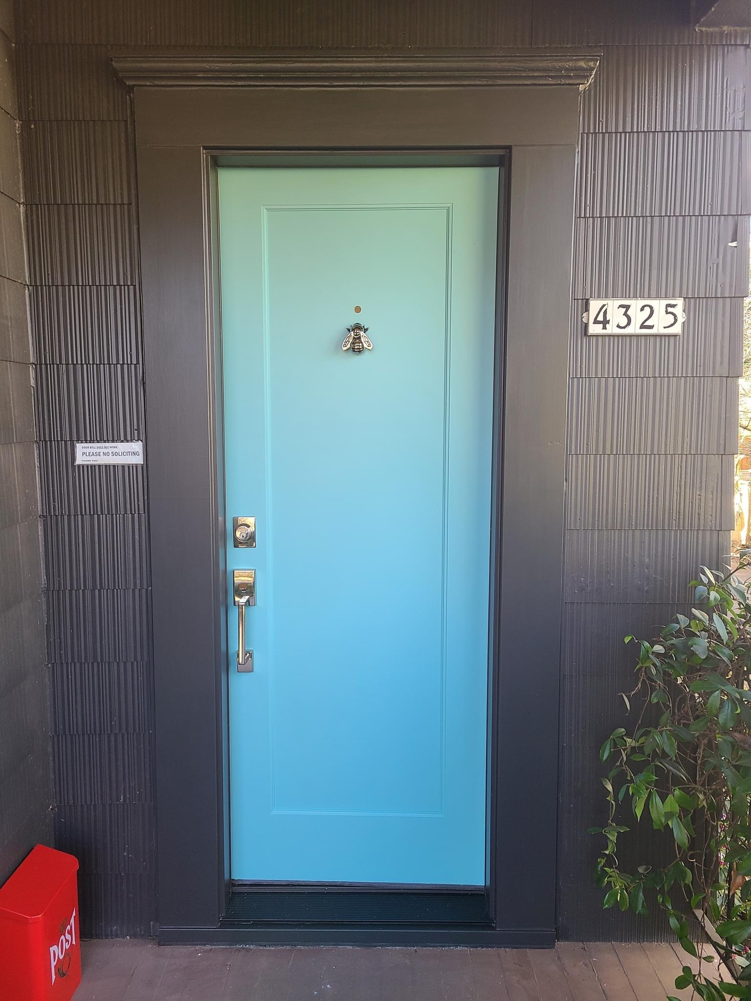 Sky blue entry door with charcoal trim, Portland metro