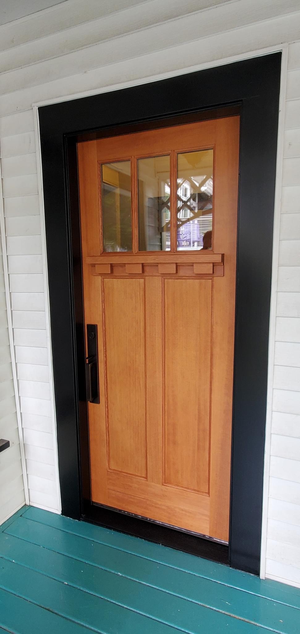 Craftsman door in natural fir with black trim, Salem